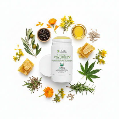 Pure and Natural Pet Paw Rescue balm surrounded by botanical ingredients used in the formula