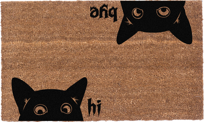 Close-up of Hi Bye Cat doormat showing black cat graphics, lettering, and natural coir texture