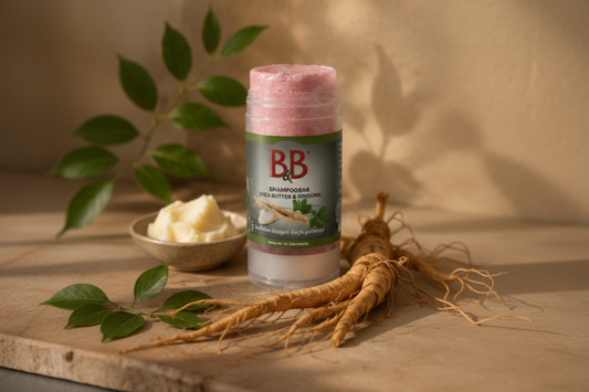 B&B Organic Shampoo Bar with Shea Butter & Ginseng surrounded by shea butter and ginseng root