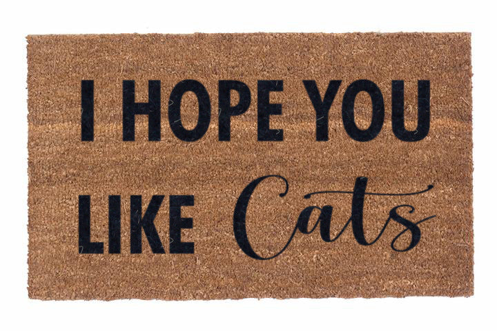 I Hope You Like Cats coir doormat shown at a front entrance with cat-themed lettering