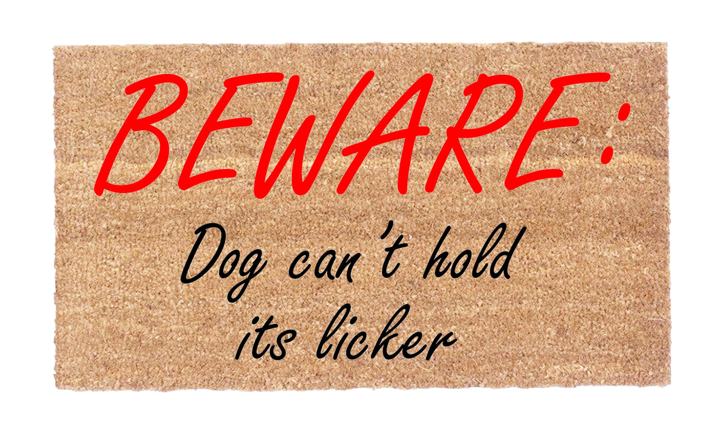 Close-up of Beware: Dog Can’t Hold Its Licker coir doormat lettering