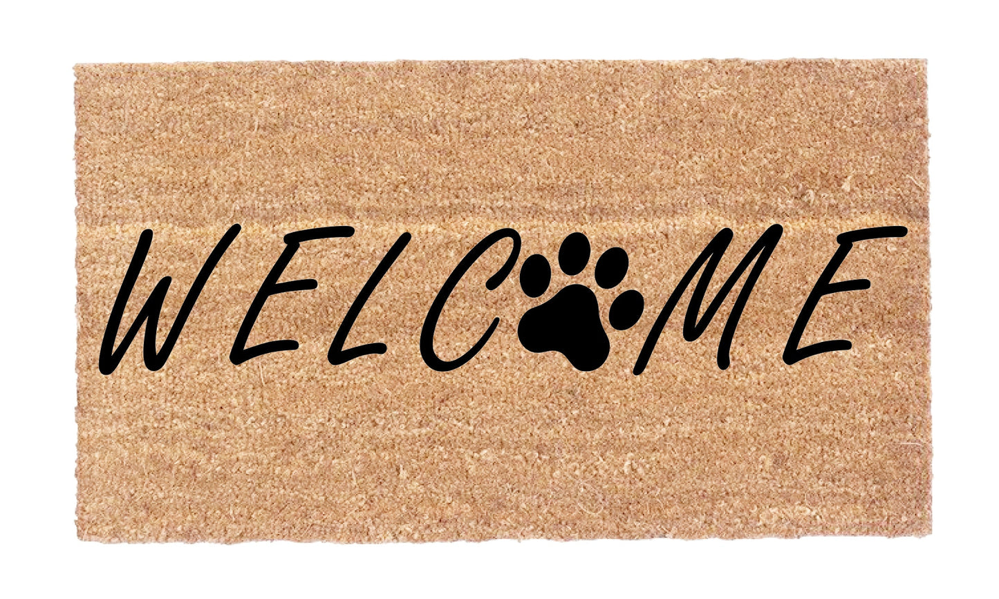 Close-up of natural coir fiber and black paw print detail on Welcome Dog Paw Coco Doormat
