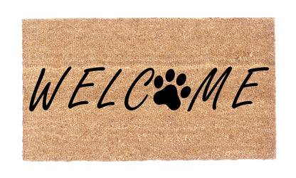 Close-up of natural coir fiber and black paw print detail on Welcome Dog Paw Coco Doormat